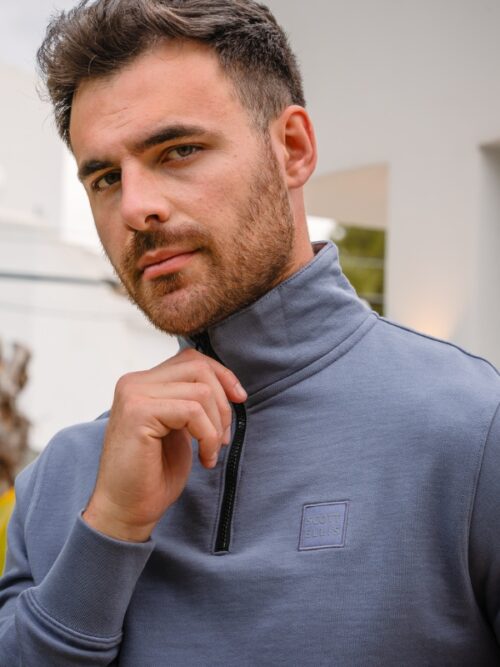 Jumper with a zip in grey